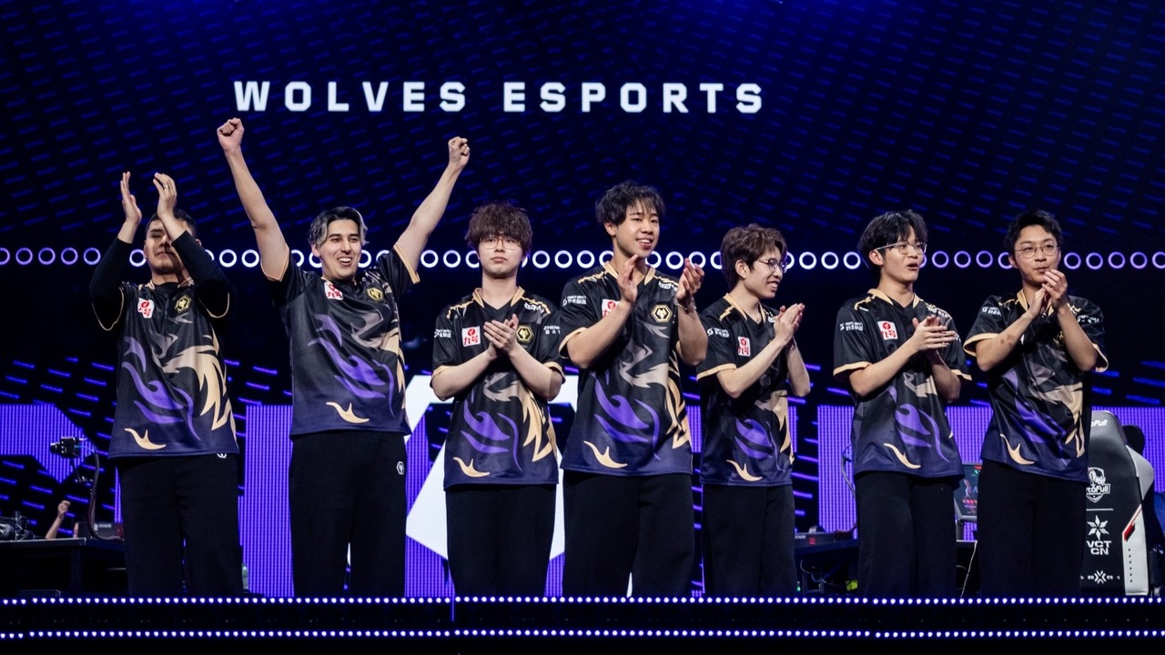 Wolves Esports Valorant players celebrate together on stage