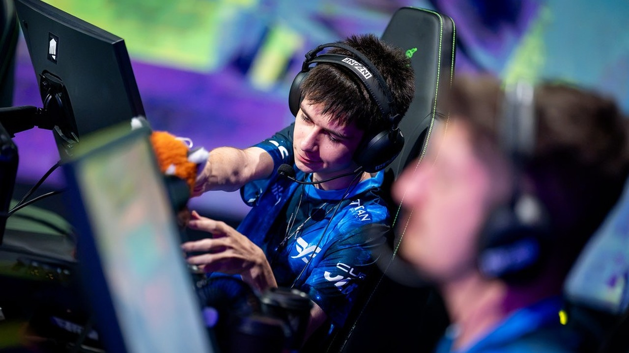Fire Flux Valorant players exchange high fives at their desks