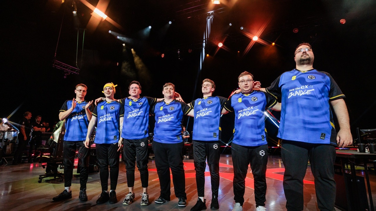 GIANTX Valorant players stand together on stage