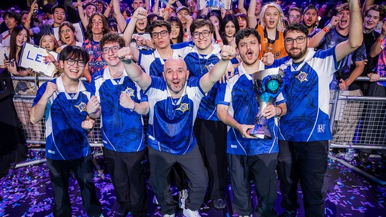 Titan Valorant players sit together at their gaming desks